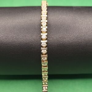 Elegant Goldtone and Silver Bracelet